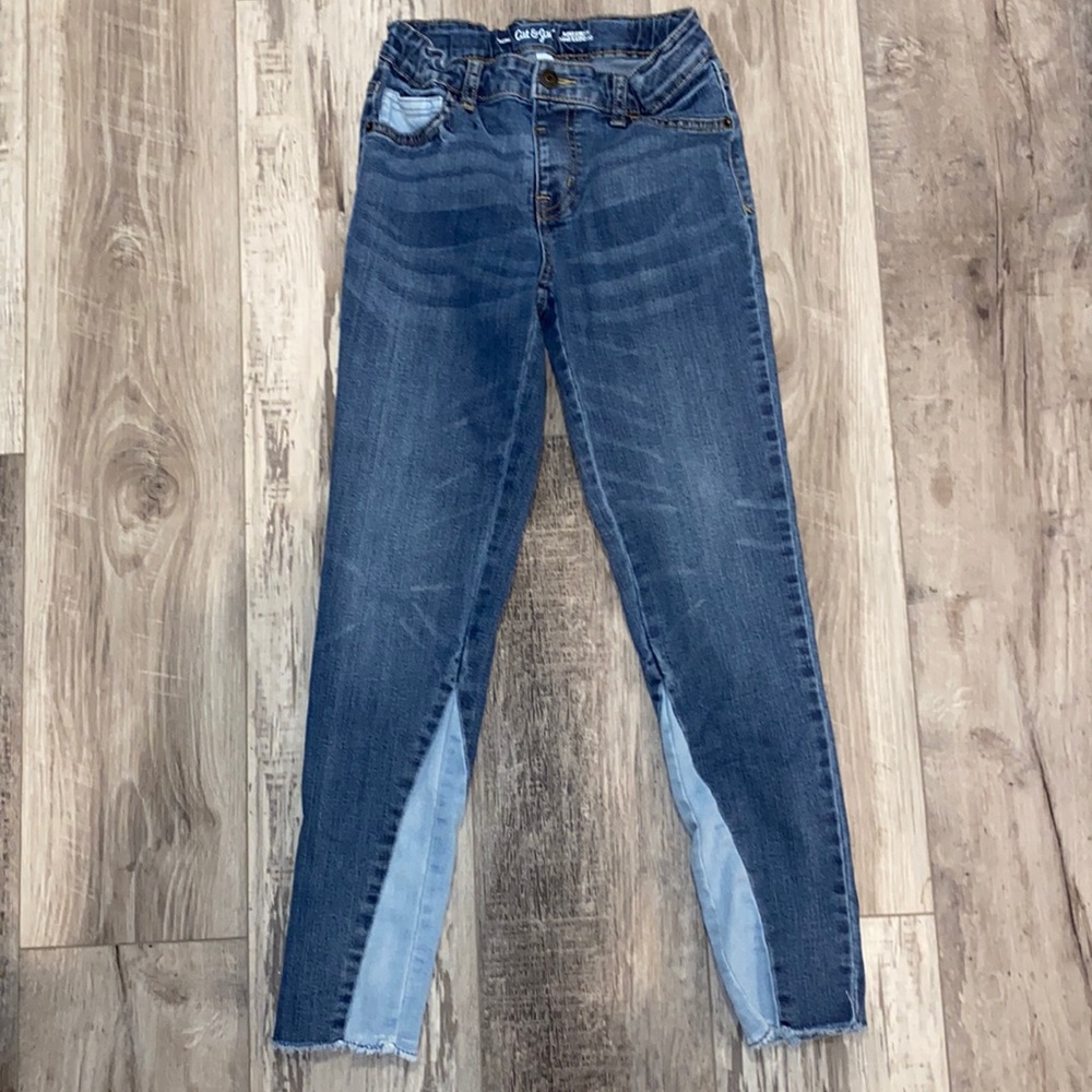 Size 14 with snap closure, faux zipper, elastic waist, never worn